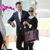 Reese Witherspoon et son mari et désormais papa Jim Toth, heureux et complices, le 14 novembre 2012 à Los Angeles.
