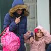 Katie Holmes se promène avec sa fille Suri à New York par un froid glacial le 11 décembre 2012.