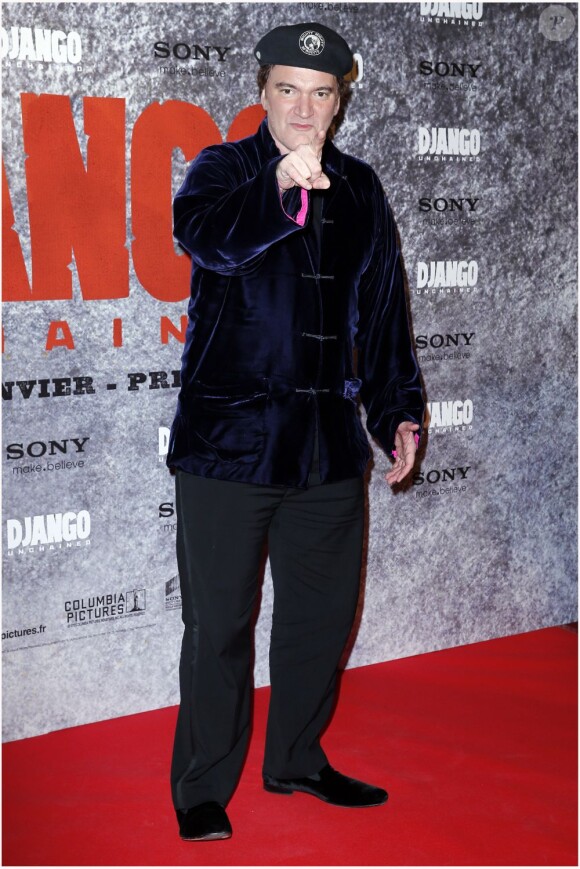 Quentin Tarantino pose devant les objectifs sur le tapis rouge de l'avant-première parisienne du film Django Unchained au Grand Rex, le 7 janvier 2013.