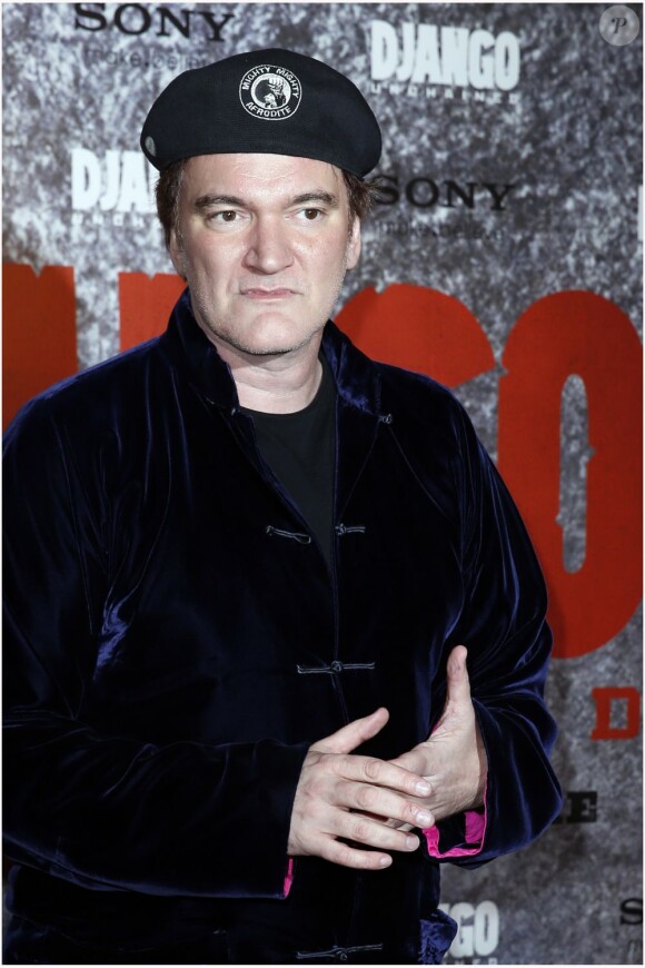 Quentin Tarantino devant les photographes présents à l'avant-première du film Django Unchained au Grand Rex de Paris, le 7 janvier 2013.