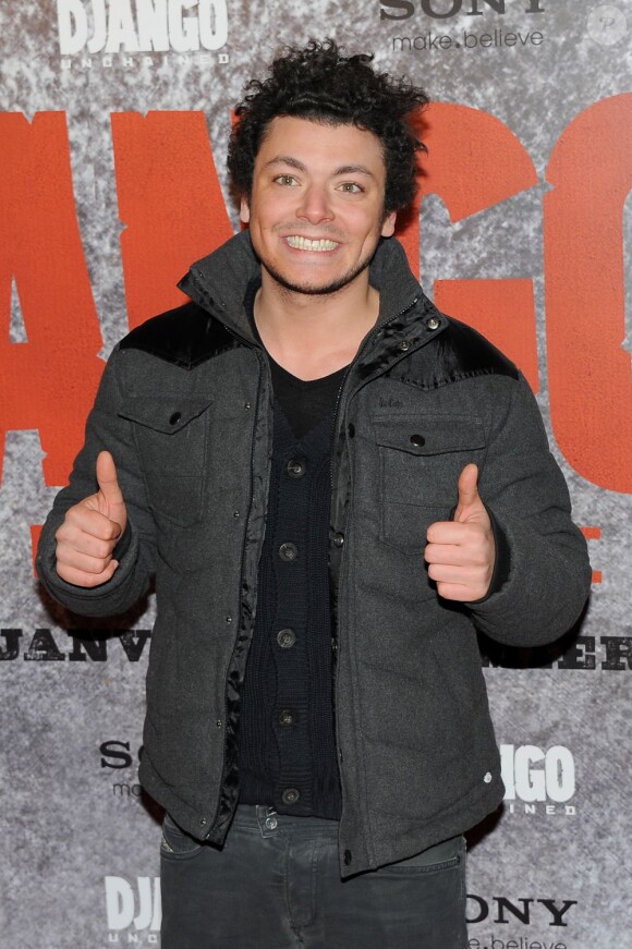 Kev Adams savoure sa présence à l'avant-première du film Django Unchained au Grand Rex de Paris, le 7 janvier 2013.