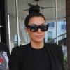 Kim Kardashian, enceinte, quitte le restaurant Serafina en compagnie de son ami Jonathan Cheban. Miami, le 7 janvier 2013.