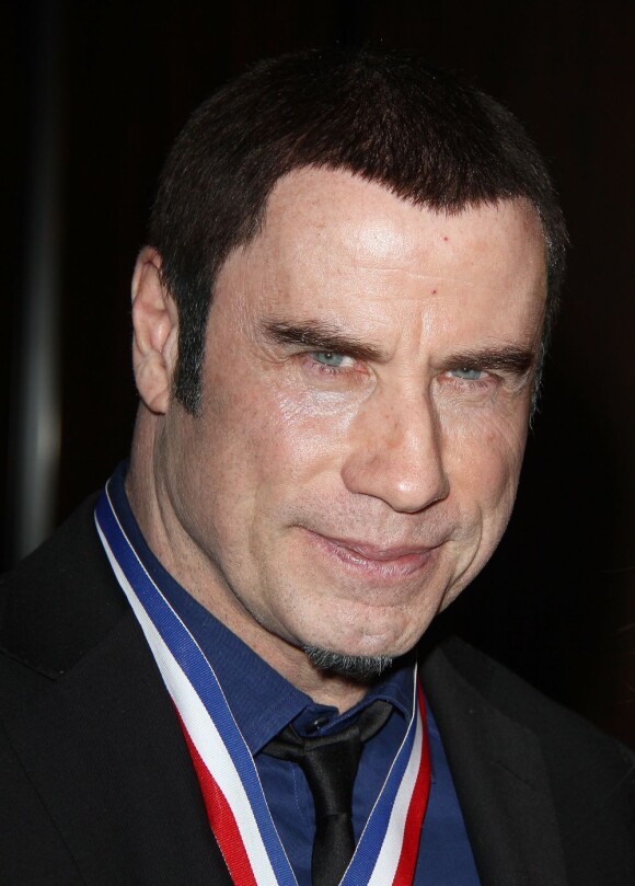 John Travolta pendant la 10e cérémonie annuelle Living Legends of Aviation Awards à Beverly Hills, le 18 janvier 2013.