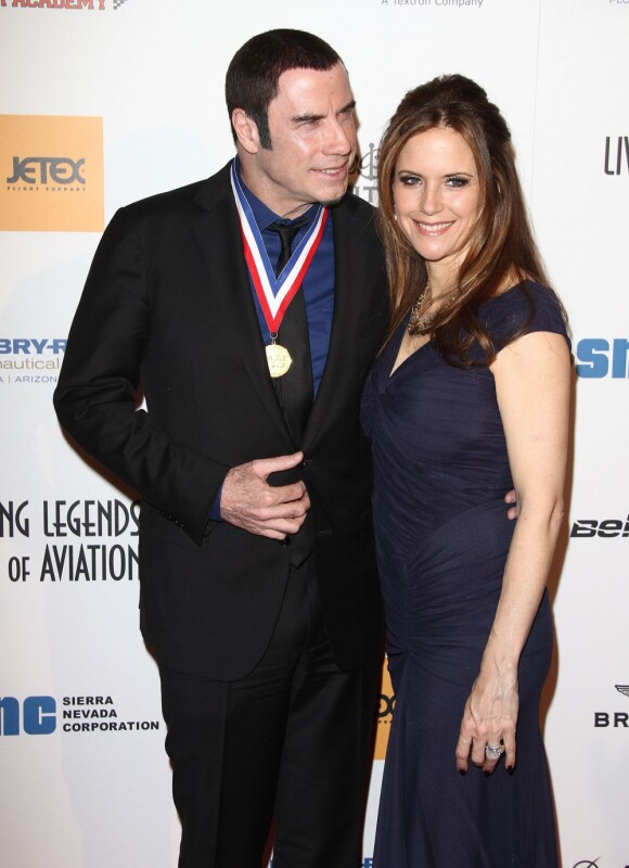 John Travolta et sa superbe Kelly Preston lors de la 10e cérémonie annuelle Living Legends of Aviation Awards à Beverly Hills, le 18 janvier 2013.