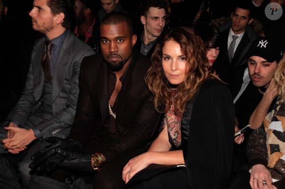 Kanye West et Noomi Rapace au défilé Givenchy collection prêt-à-porter hommes 2013-2014 à Paris le 18 janvier 2013