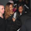 Rihanna quitte le Playhouse, une boîte de nuit de Los Angeles, au bras de son amie Melissa, le 24 janvier 2013. Rihanna arbore une robe très courte noire transparente sans soutien-gorge sur de somptueux talons.