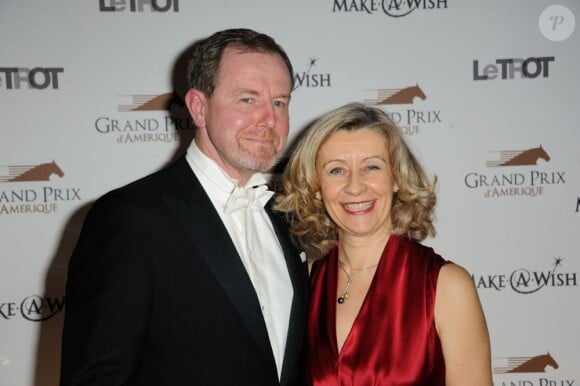 La ministre Hélène Conway-Mouret et son mari lors du dîner de gala du 92e Prix d'Amérique, le 26 janvier 2013 au Grand Palais à Paris.