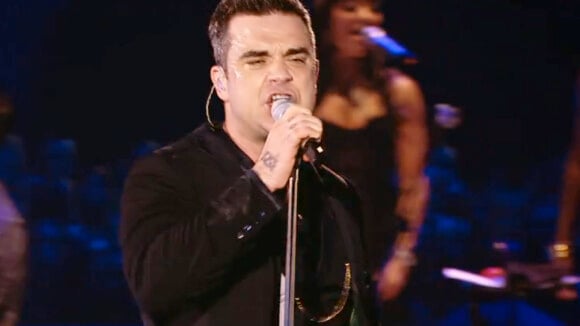 Robbie Williams overbooké : Clip, tournée solo et retrouvailles avec Take That