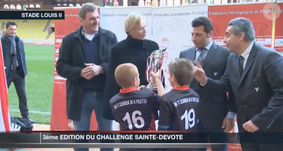 La princesse Charlene faisait équipe avec Byron Kelleher le 2 février 2013 au Stade Louis-II pour le 3e Challenge Sainte-Dévote, un tournoi rugby junior.