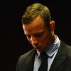 Oscar Pistorius, accusé du meurtre de sa petite amie Rrrva Steenkamp, lors de son second jour d'audience au tribunal de Pretoria le 20 février 2013