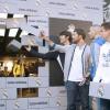 Kaka, Xabi Alonso, Karim Benzema et les joueurs du Real de Madrid lors de l'inauguration de la nouvelle boutique Adidas au stade Santiago Bernabeu de Madrid le 21 février 2013