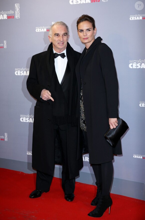Alain Terzian et sa compagne lors de la cérémonie des César le 22 février 2013 à Paris