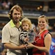 Kim Clijsters, son mari Brian Lynch et leur fille Jada lors de sa victoire à l'US Open le 13 septembre 2009 à New York