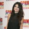 Selena Gomez en combinaison noire légérement transparente à Rome le 22 février 2013.