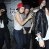 Kristen Stewart escortée par une amie à la sortie de la boîte de nuit Troubadour à West Hollywood, le 5 mars 2013
