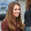 La belle Kate Middleton, enceinte, visite l'Académie Havelock à Grimsby, le 5 mars 2013.