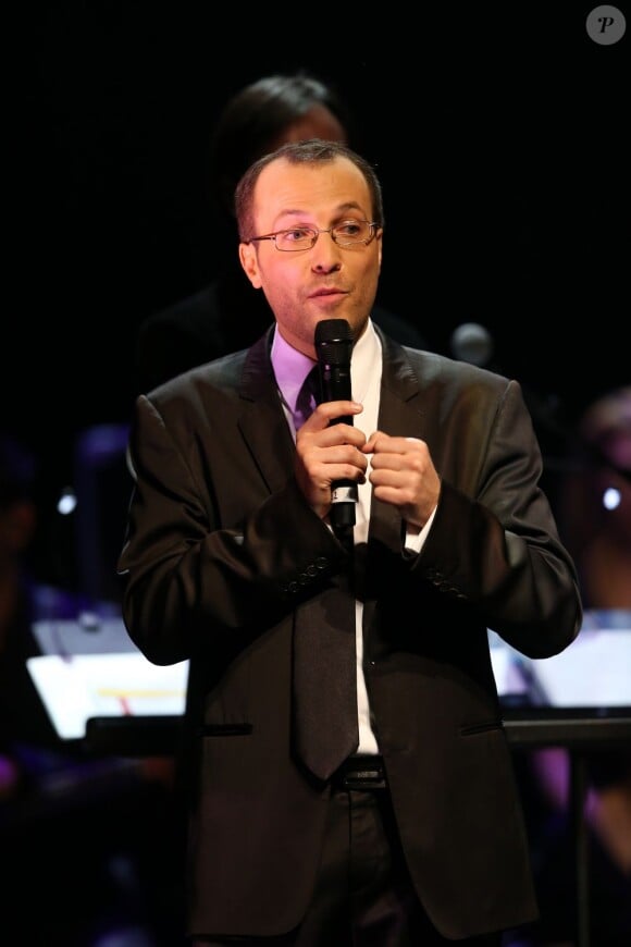 Nicolas Rossignol, président de l'association Tout le monde chante contre le cancer, au gala "2000 femmes chantent contre le cancer" à l'Olympia de Paris, le 7 mars 2013.