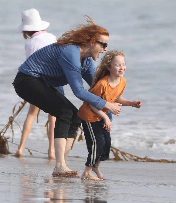 Marcia Cross (Desperate Housewives) a fêté le 25 mars 2013 ses 51 ans. L'actrice a passé sa journée sur la plage avec ses filles Eden et Savannah à Santa Monica.