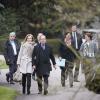 François Hollande et Valérie Trierweiler quittent la préfecture pour marcher dans les rues de Tulle, le 6 avril 2013.