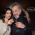 Jean-Claude Dreyfus et Rachida Khalil à la soirée Nicolas Feuillatte, célèbre maison de champagne, aux Salons France Amériques à Paris, mercredi 10 avril 2013.