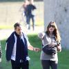 Nicolas Sarkozy se balade avec son épouse Carla Bruni quelques jours après la naissance de leur fille Giulia, née le 19 octobre 2011.