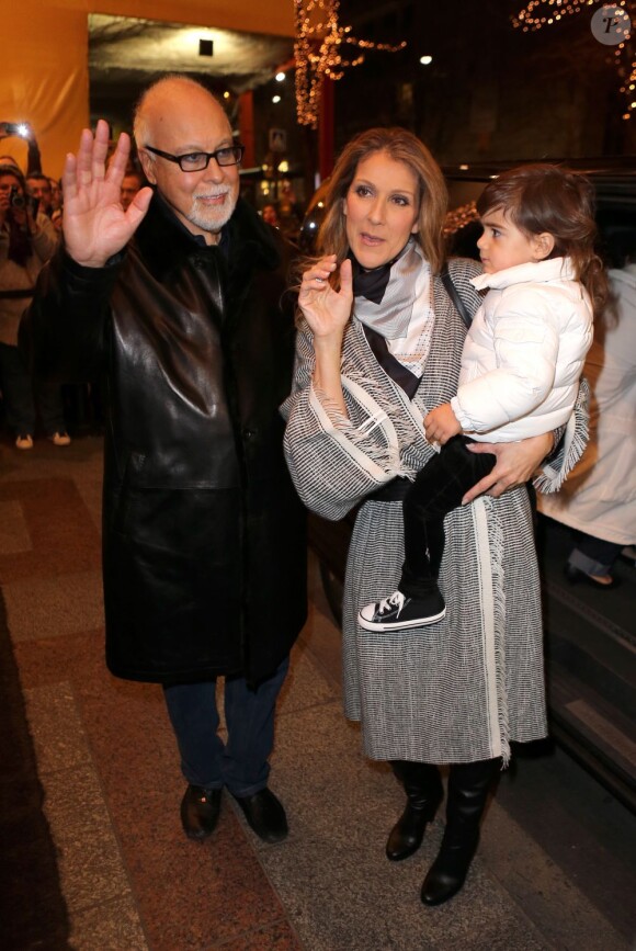 Céline Dion, avec son mari René Angélil et un de leurs jumeaux (Eddy) quittent l'hôtel du George V à Paris, le 30 novembre 2012.