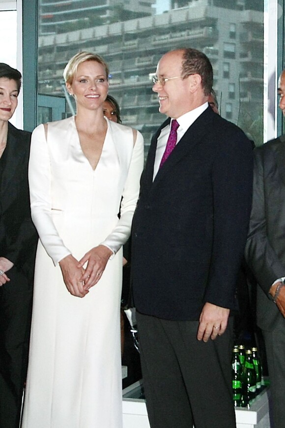 La princesse Charlene de Monaco et le prince Albert à la soirée d'inauguration du club privé Italian Luxury Club au Zelos, au Forum Grimaldi, le 10 mai 2013.