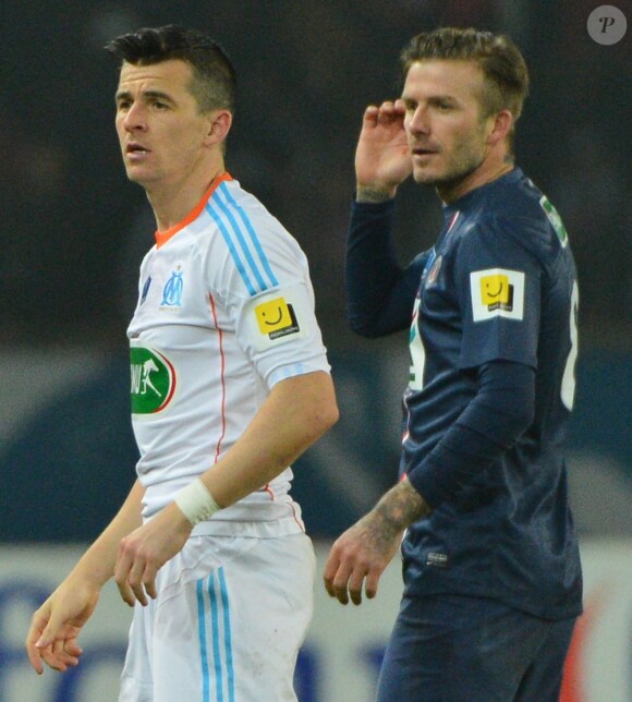 David Beckham et Joey Barton lors du huitième de finale entre le Paris Saint-Germain et Marseille à Paris le 27 février 2013 au Parc des Princes