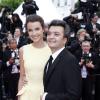 Thomas Langmann et Céline Bosquet pendant la montée des marches du film Inside Llewyn Davis lors du 66e festival du film de Cannes, le 19 mai 2013.