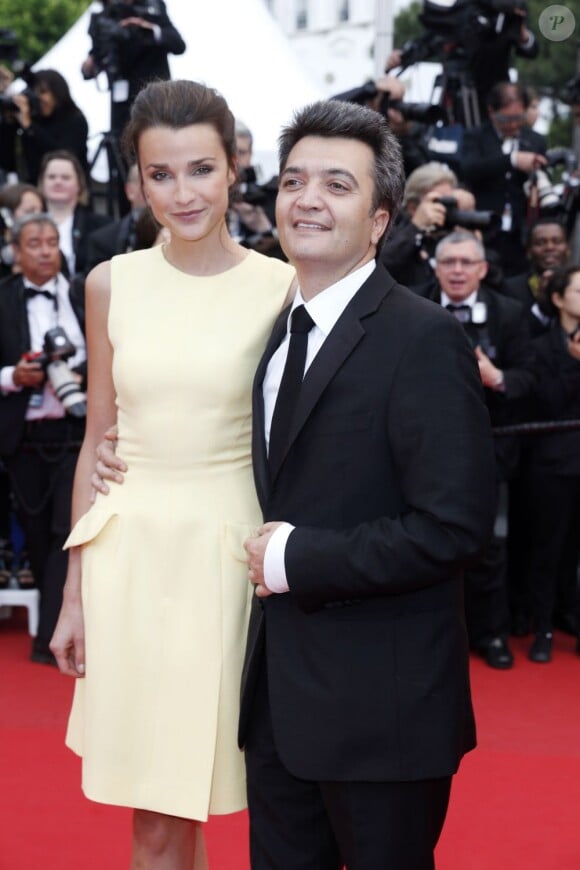 Thomas Langmann et Céline Bosquet pendant la montée des marches du film Inside Llewyn Davis lors du 66e festival du film de Cannes, le 19 mai 2013.