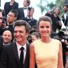 Thomas Langmann et Céline Bosquet, radieux et amoureux pour la montée des marches du film Inside Llewyn Davis lors du 66e festival du film de Cannes, le 19 mai 2013.
