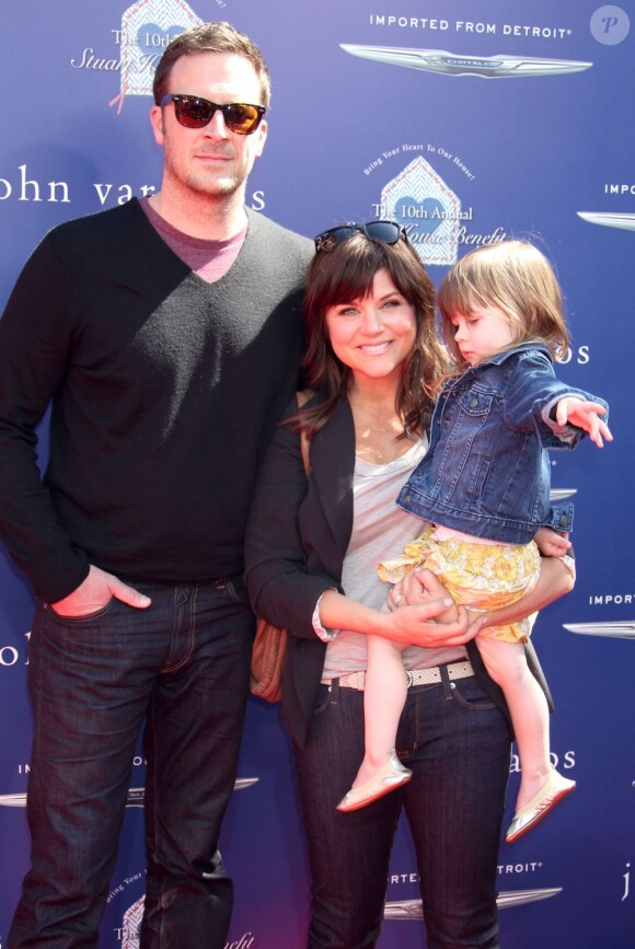 Tiffani Thiessen, son mari Brady Smithet leur fille Harper à la soirée Stuart House Benefit à la boutique John Varvatos à Los Angeles, le 10 mars 2013.