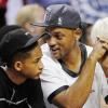 Will Smith et son fils Jaden assistent au match de basket Miami Heat contre Chicago Bulls à Miami, le 15 mai 2013.