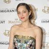 Marion Cotillard lors de la soirée du film The Immigrant sur la plage Magnum au Festival de Cannes le 24 mai 2013