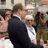 Le prince Albert II de Monaco, Bernie Ecclestone dans les allées du paddock du Grand Prix de F1 de Monaco le 25 mai 2013