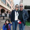 Flavio Briatore, sa femme Elisabetta Gregoraci et leur fils Falco Nathan dans les allées du paddock du Grand Prix de F1 de Monaco le 25 mai 2013