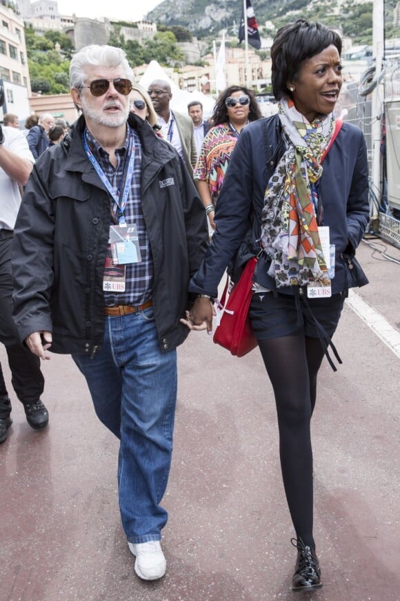 George Lucas, Mellody Hobson dans les allées du paddock du Grand Prix de F1 de Monaco le 25 mai 2013