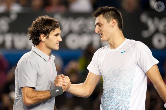 Roger Federer et Bernard Tomic à Melbourne le 19 janvier 2013
