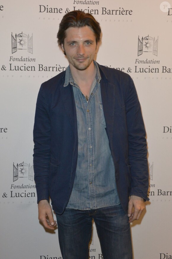 Raphaël Personnaz à l'avant-première du film Les Petits Princes précédée de la remise du Prix Lucien Barrière au Publicis à Paris, le 5 juin 2013.