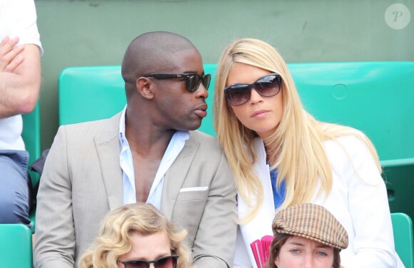 Rio Mavuba et sa compagne Elodie à Roland-Garros lors du 12e jour des Internationaux de France le 6 juin 2013