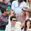 Pascale Arbillot, la chanteuse Anaïs et un ami à Roland-Garros lors du 12e jour des Internationaux de France le 6 juin 2013