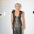  Kate Winslet adopte la tendance métallique glamour dans une robe dorée et argentée 