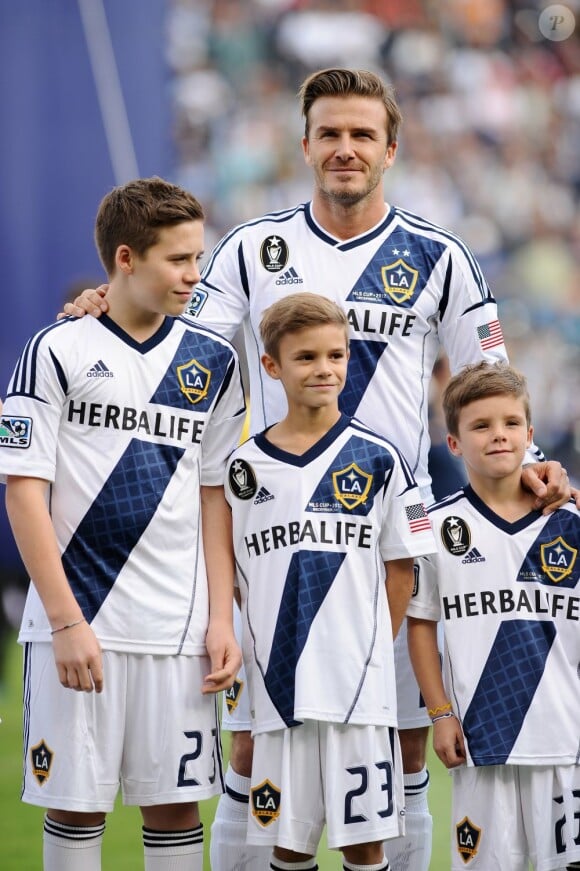 David Beckham et ses trois garçons Brooklyn, Romeo et Cruz Beckham au Home Depot Center de Carson City le 1er décembre 2012