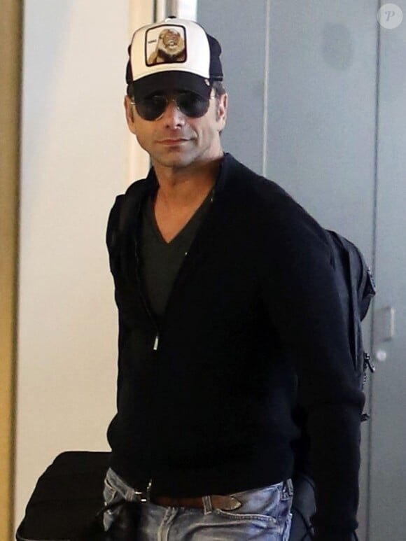 Exclusif - John Stamos à l'aéroport de Vancouver, le 31 mars 2013.