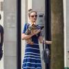 La belle Miranda Kerr promène son chien Frankie à New York le 19 mai 2013