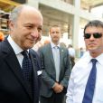 Laurent Fabius et Manuel Valls à Doha le 23 juin 2013.