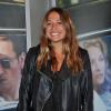 Izïa Higelin souriante et lookée pour la première du film Pour une Femme au cinéma Publicis des Champs-Elysées à Paris le 24 juin 2013.