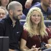 Gerard Piqué et Shakira lors du match de basket entre Barcelone et le Panathinaïkos à Barcelone, le 25 avril 2013