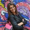 EXCLU - Laury Thilleman, radieuse, prend la pose avec son sac La Halle au Dôme à Paris, le jeudi 27 juin 2013