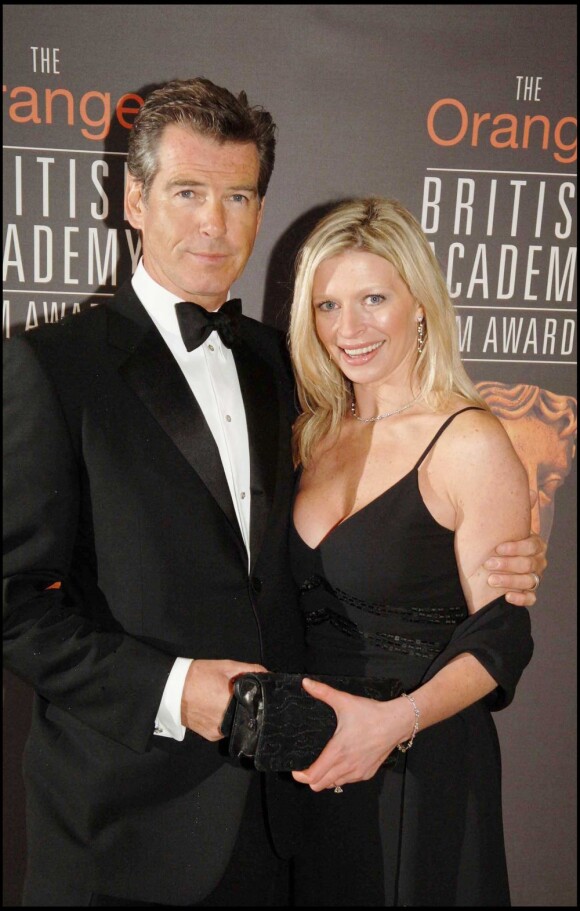 Pierce Brosnan et sa fille disparue Charlotte. En février 2006 à Londres